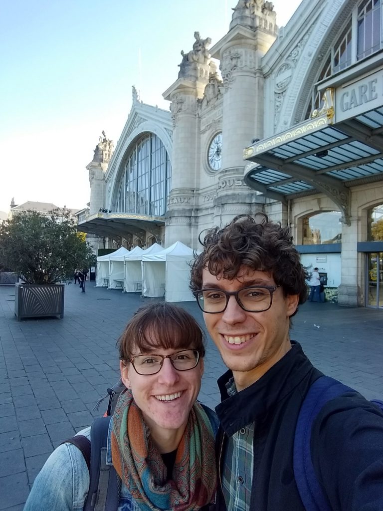 Caitlin and her husband outside Tours train station